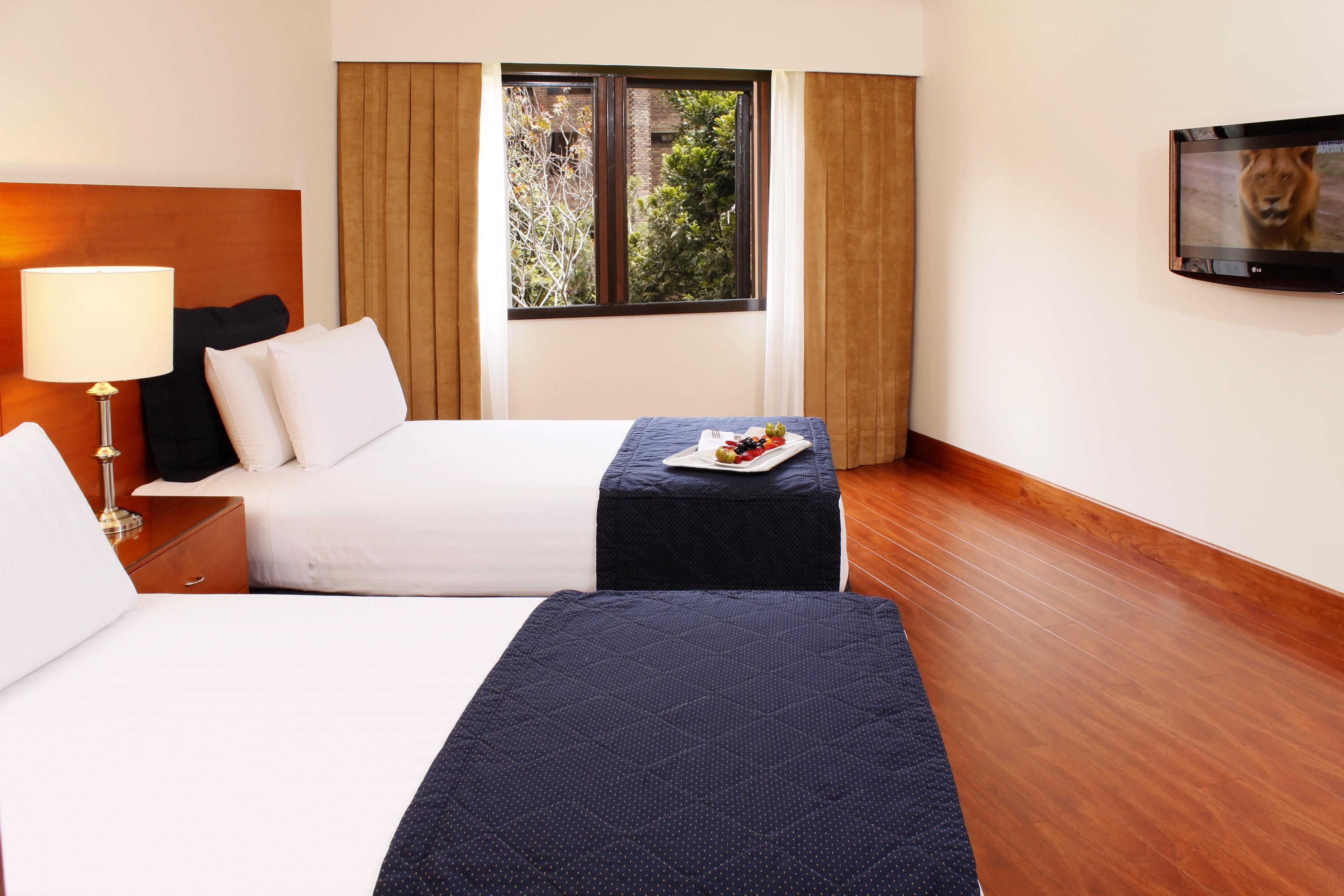 Hotel Estelar La Fontana Bogotá Exterior foto A room at the hotel